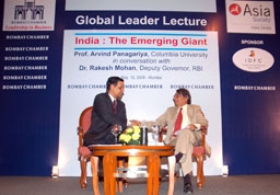 Professor Arvind Panagariya and Dr. Rakesh Mohan shake hands on stage following the event in Mumbai on May 12, 2008. (Photo courtesy of Bombay Chamber of Commerce)