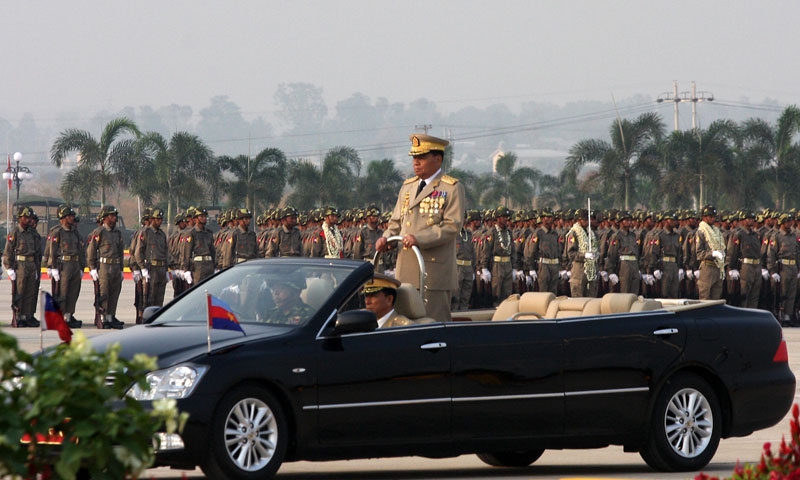 Myanmar's junta chief Than Shwe reviews an honor guard from his car on Armed Forces Day in the administrative capital of Naypyidaw on March 27, 2009. (Hla Hla Htay/AFP/Getty Images)