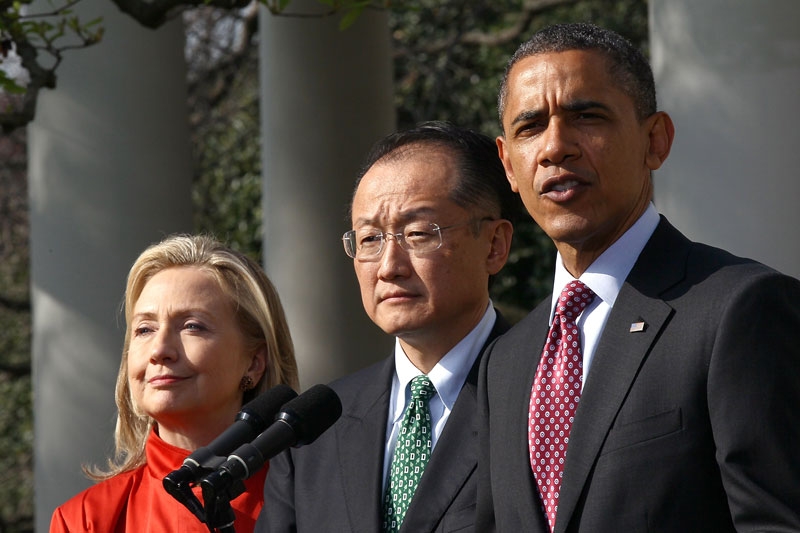 U.S. President Barack Obama (R) announces the nomination of Dartmouth College President Jim Yong Kim (C) for president of the World Bank, as Secretary of State Hillary Clinton (L) looks on, in Washington, DC on March 23, 2012. (Win McNamee/Getty Images) 