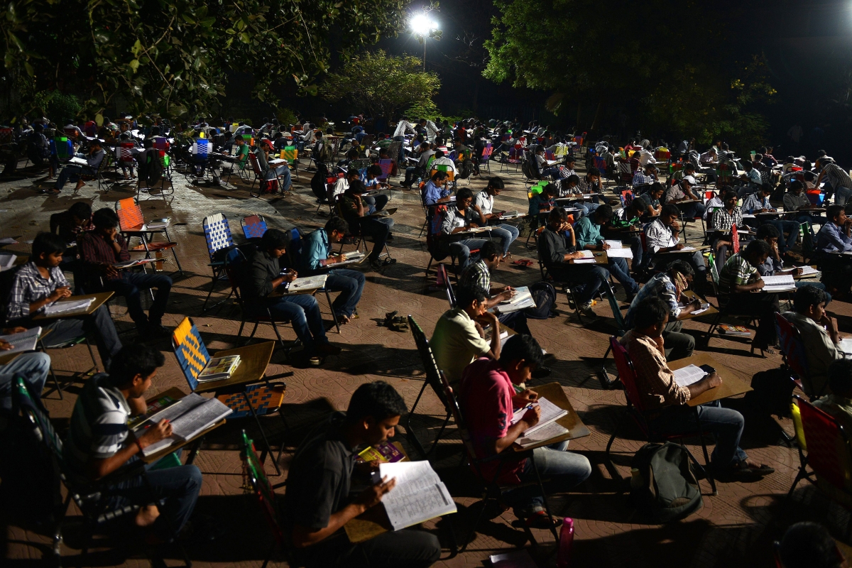 Students study for competitive exams in an open space of the City Central Library in Hyderabad.