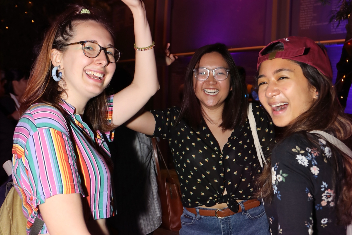 Friends show off their moves at a Friday Leo Bar. (Ellen Wallop/Asia Society)
