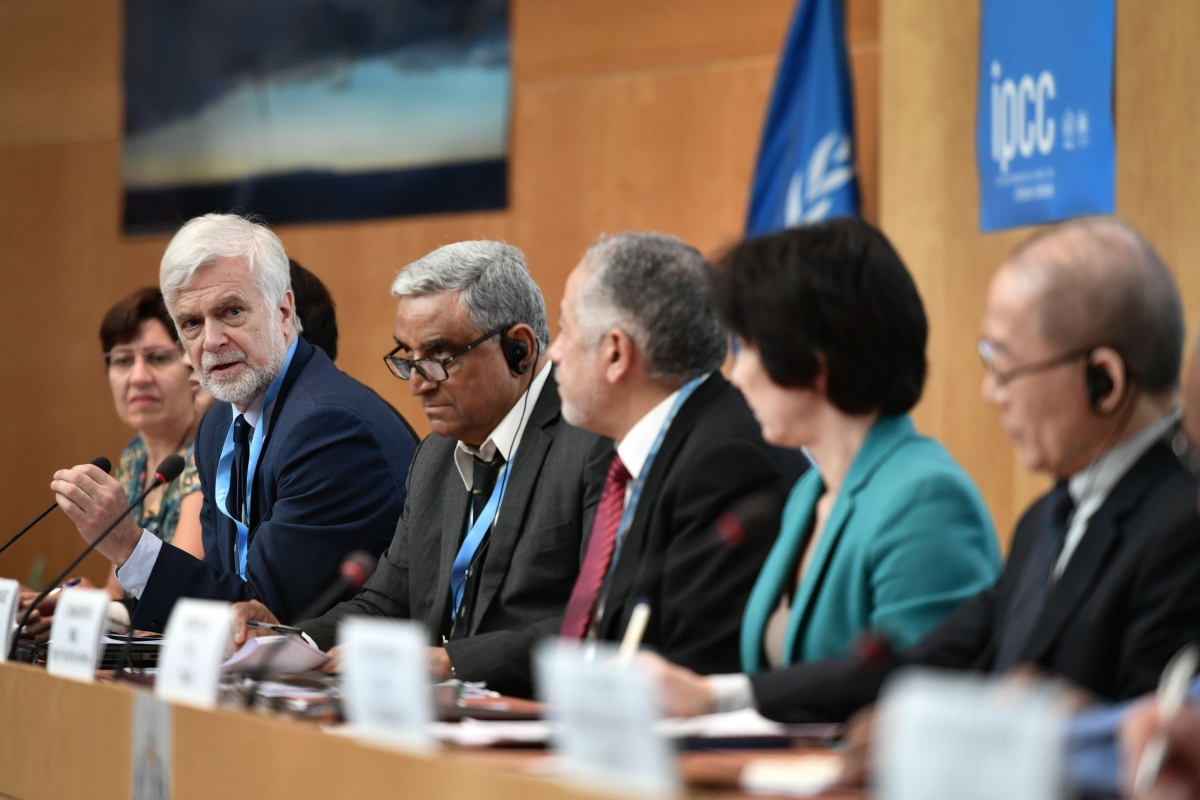 Intergovernmental Panel on Climate Change (IPCC) working group III co-chair Jim Skea (2nd L) answers a question during a press conference on a special IPCC report on climate change and land on August 8, 2019 in Geneva.
