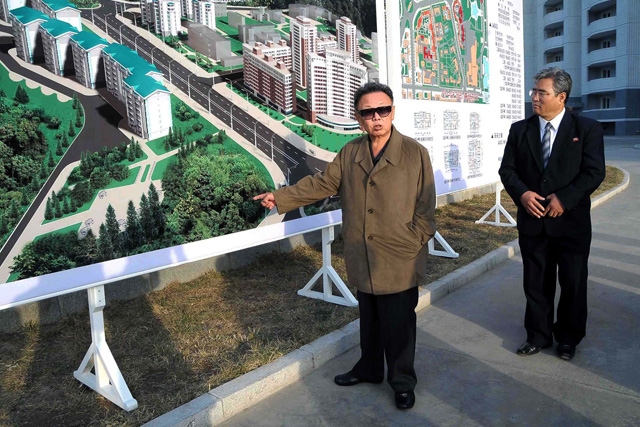 North Korean leader Kim Jong Il inspecting a newly-built apartment complex in Pyongyang, North Korea, in an undated image released in October 2009. (KNS/AFP/Getty Images)