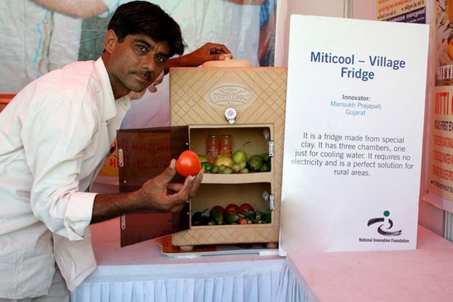 Indian inventor Mansukhbhai Prajapati poses with his ‘Mitticool (mud cool) Village Fridge’ in Ahmedabad. (Blood Orange Media)