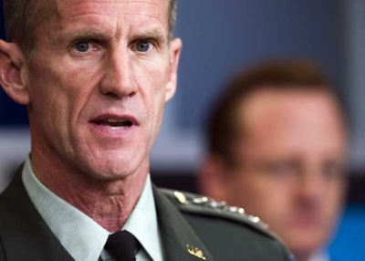 US commander in Afghanistan General Stanley McChrystal (R) speaks during a press briefing with White House spokesman Robert Gibbs (rear) on May 10, 2010. (Jim Watson/AFP/Getty Images)