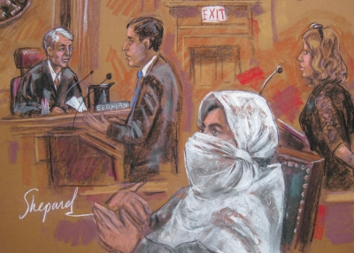 This September 23, 2010 courtroom drawing shows Pakistani scientist Dr. Aafia Siddiqui (C) with Judge Richard Berman (L), US Assistant Attorney Christopher LaVigne (2ndL) and Attorney Linda Moreno (R) in New York. A US federal court Thursday sentenced Aafia Siddiqui to 86 years in prison for attempted murder of US officers in Afghanistan. (Shirley Shepard/AFP/Getty Images)