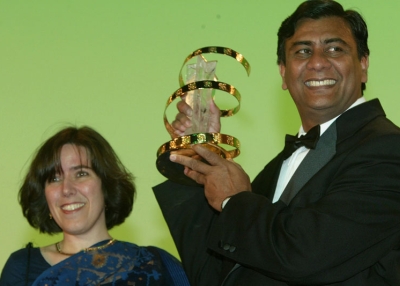 Clay Bird director Tareque Masud (R) wins the prize for best script with his wife Catherine Masud (L) at the closing ceremony of the 2nd Marrakesh International Film Festival in Marrakesh, Morocco on Sept. 22, 2002. (Pascal Le Segretain/Getty Images) 