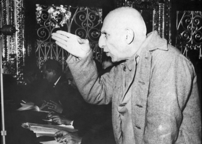 Picture dated 20 November 1953 of Iranian ex-Premier Mohammed Mossadegh using his hand to make a point during one of his frequent interruptions of court proceedings in Tehran's military tribunal, trying him for treason. (STF/AFP/Getty Images)