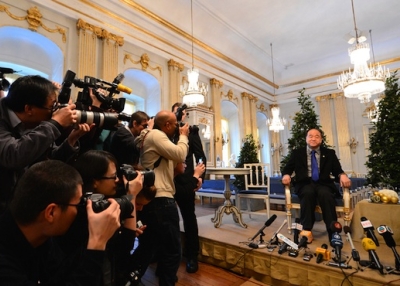 Chinese writer and 2012 Nobel Literature Prize laureate Mo Yan poses for photographers before giving a press conference in Stockholm on December 6, 2012. (Jonathan Nackstrand/AFP/Getty Images)