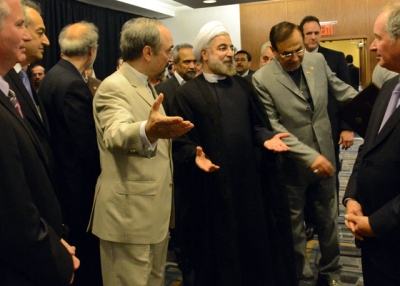 Iranian President Dr. Hassan Rouhani (C) arrives with his entourage for an Asia Society event in New York on September 26, 2013. (Kenji Takigami/Asia Society)