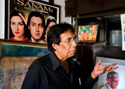 Lollywood poster artist Sarfraz Iqbal in his Lahore studio in September 2014. (Saad Sarfraz Sheikh)