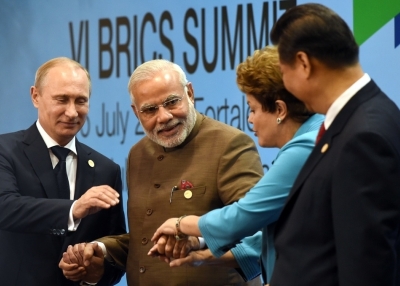 (L to R) Russian President Vladimir Putin, Indian Prime Minister Narendra Modi, Brazilian President Dilma Rousseff, and Chinese President Xi Jinping during the 6th BRICS Summit in Fortaleza, Brazil, on July 15, 2014. (Yasuyoshi Chiba/Getty Images)