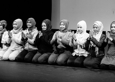 The Tari Aceh troupe performing a sitting dance at the workshop. (Vaishali Nayak)