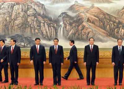 The new Politburo Standing Committee members (Xi Jinping, 3rd from left) meet the press at the Great Hall of the People in Beijing on November 15, 2012. (Mark Ralston/AFP/Getty Images)