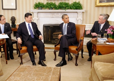  U.S. President Barack Obama (2nd R) and Chinese then-Vice President Xi Jinping (2nd L) communicate through translators while meeting in the Oval Office at the White House on Feb. 14, 2012 in Washington, DC. (Chip Somodevilla/Getty Images) 
