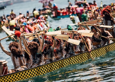 Competitors dressing in costumes paddle their boats during the Hong Kong Airlines Fancy Dress Race at the Hong Kong Dragon Boat Carnival Race on July 5, 2015 in Hong Kong. (Anthony Kwan/Getty Images for Hong Kong Images)