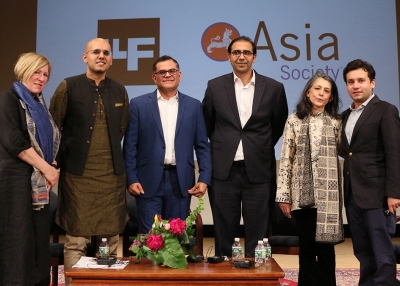 Panelists and organizers pose on stage at Lahore Literary Festival New York 2018