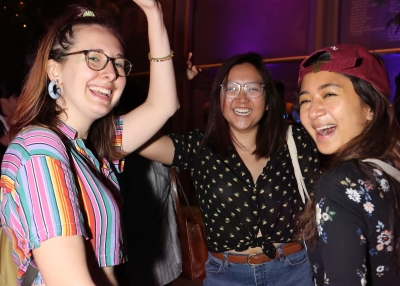 Friends show off their moves at a Friday Leo Bar. (Ellen Wallop/Asia Society)