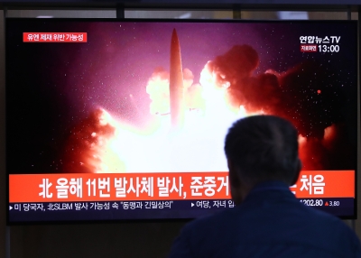 A man in South Korea watches a North Korean missile launch