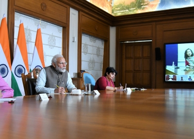 Indian Prime Minister Narendra Modi holds a video conference with journalists on tackling coronavirus in New Delhi on March 24, 2020