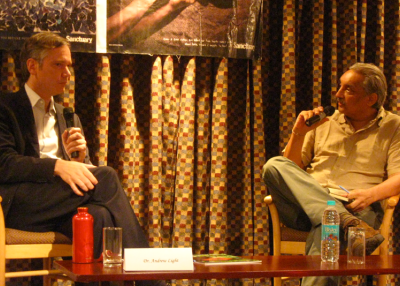 Dr. Andrew Light, left, discussed climate change policy with Bittu Sahgal.