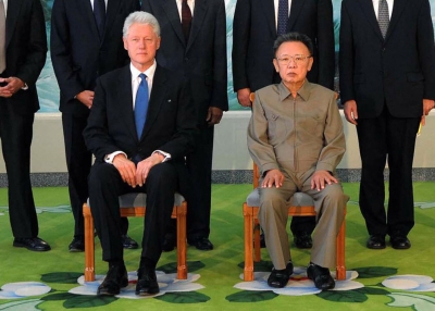 North Korean leader Kim Jong-Il (R) posing with former US president Bill Clinton (L) in Pyongyang after securing a pardon for two US journalists, Clinton's spokesman said. (KNS/AFP/Getty Images)