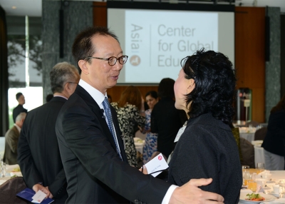 Council member Antony Leung with a guest at an Asia Society event