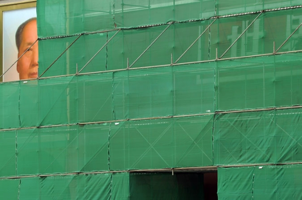 Chairman Mao's portrait is only partially visible as scaffolding covers Tiananmen Gate during renovations on September 15, 2010, ahead of National Day celebrations.