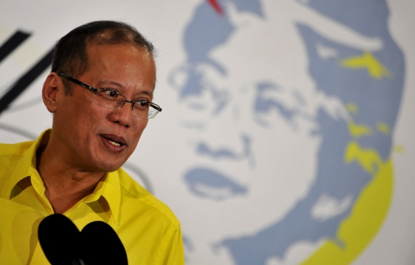 Philippine President Benigno Aquino speaks during a press conference after a mass to commemorate the first anniversary of the death of late president Corazon Aquino, at the La Salle Gymnasium in Mandaluyong, in the eastern Manila suburbs on August 1, 2010. (Noel Celis/AFP/Getty Images)