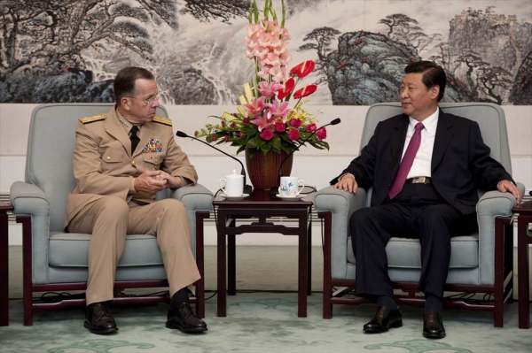  Chinese Vice President Xi Jinping (R), the presumptive heir to current President Hu Jintao, speaks with former Chairman of the Joint Chiefs of Staff Admiral Mike Mullen  in Beijing on July 11, 2011. Xi is just one of several new world leaders who could have a major impact on Asia in 2012 and beyond. Photo by Chad J. McNeeley. (Flickr/Chairman of the Joint Chiefs of Staff)