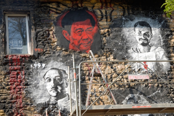 The likeness of Bo Xilai, in red, adorns the "Abode of Chaos" in France. (Thierry Ehrmann/Flickr)