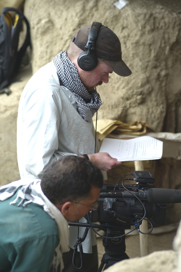 Filmmaker Brent Huffman interviewing an archaeologist at the Mes Aynak site. (Frank Petrella)