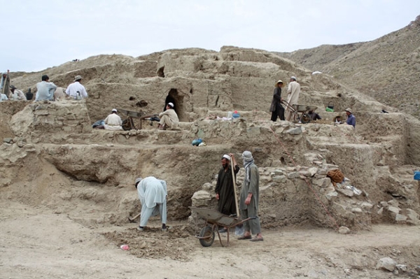 Workers excavate a 2,000-year-old archaeological site discovered in Mes Aynak, Afghanistan in August 2010. (Joanie Meharry)