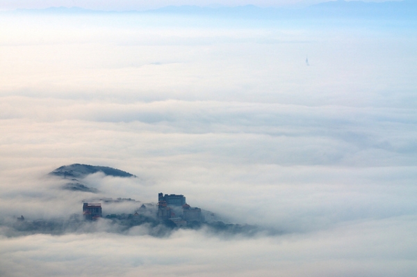 A view of Taipei City from above the clouds on March 1, 2012. (Max Chu/Flickr)