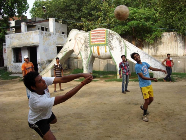 Boys playing traditional volleyball in Chandrawal Village, in north Delhi, at a site sponsored and organized through the 'Khelo Dilli' campaign run by Stairs and Uflex, a packaging company. (Arthur Dudney)