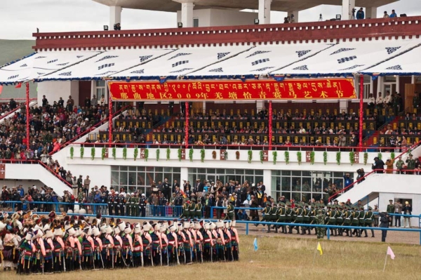 What was once a grassroots grassland festival is now an organized spectacle featuring military parades and mass performances by thousands of dancers. (Michael Yamashita)