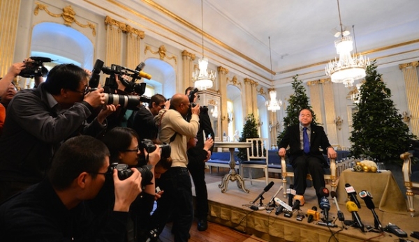 Chinese writer and 2012 Nobel Literature Prize laureate Mo Yan poses for photographers before giving a press conference in Stockholm on December 6, 2012. (Jonathan Nackstrand/AFP/Getty Images)