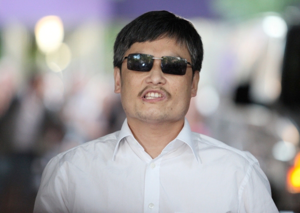 Blind Chinese activist Chen Guangcheng, best known for exposing China's alleged abuses in official family-planning practices, escaped house arrest in China and moved to New York City with his family. Photographed in New York on May 19, 2012. (Andy Jacobsohn/Getty Images)