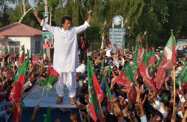 Pakistani cricketer turned politician Imran Khan led Western activists and thousands of supporters on a defiant march to the tribal belt to protest against U.S. drone strikes in Mianwali, Pakistan, on October 6, 2012. (A Majeed/AFP/GettyImages)