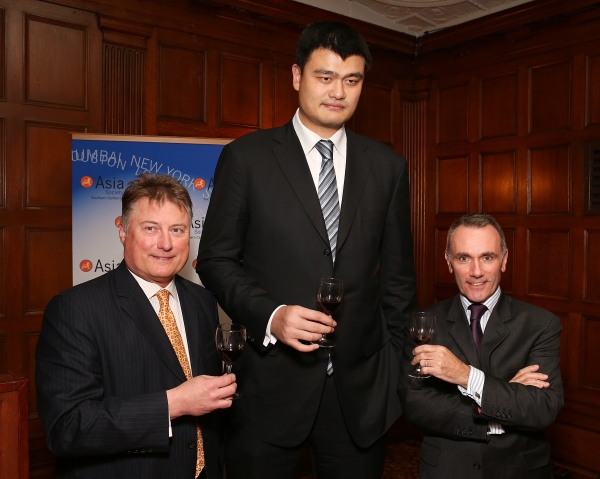 From left, Tom Hinde, Director of Winemaking Yao Family Wines; Yao Ming, honored as "Visionary of the Year" and Jean-Marc Bories, International Sales Director Girard-Perregaux pose during the Asia Society Southern California 2013 Annual Gala held at the Millennium Biltmore Hotel on Tuesday, February 19, 2013 in Los Angeles, Calif. (Photo by Ryan Miller/Capture Imaging)