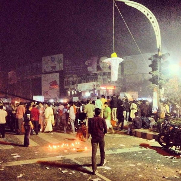 A street lamp becomes a makeshift gallows for an effigy at Shahbag. (Naorose Bin Ali)