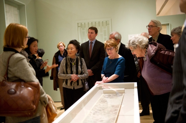 Exhibition curator Susan Tai leads viewers through the exhibition on March 5, 2013. (Elena Olivo/Asia Society)