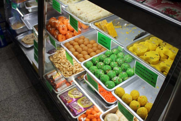 Indian desserts go global, from in a stall in Hong Kong. (ironypoisoning/Flickr)