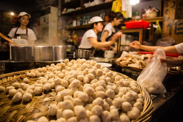 People wait to pick up food at a local eatery in Jiufen, Taiwan on May 1, 2013. (Davi Leung/Flickr)