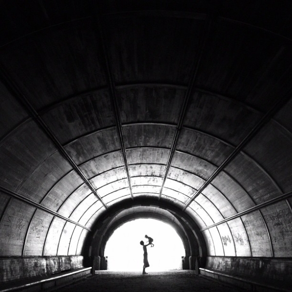 "I am in love with this photo of a friend of mine with her daughter that was taken in my favorite tunnel in Prospect Park, Brooklyn. In addition to the tender moment, it combines many photographic elements I am drawn to: leading lines, silhouettes, and glowing light." (Pei Ketron)