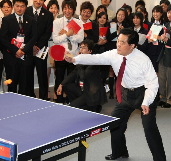 Chinese president Hu Jintao plays table tennis at Waseda University in Tokyo, Japan on May 8, 2008. (Koichi Kamoshida/Getty Images)