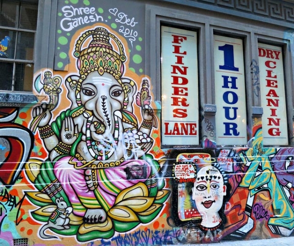 Bright street art features the Hindu god Ganesha alongside dry cleaning advertisements in Melbourne, Australia on June 21, 2013. (Andrea Lai/Flickr)