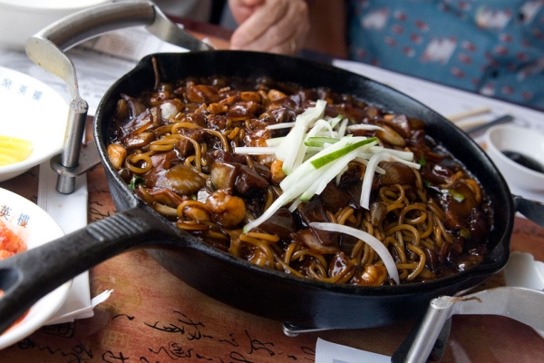 Jjajangmyeon is a "Koreanized" black bean noodle dish directly borrowed from China's zhajiangmian. (Pabo76/Flickr)