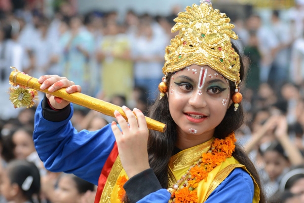 A pupil dressed as the Hindu god Krishna poses on the eve of the Janmashtami festival at a school in Amritsar, India on August 27, 2013. The Hindu festival of Janmashtami, which falls on August 28 this year, marks the birth of the Hindu god Lord Krishna. (Narinder Nanu/AFP/Getty Images)