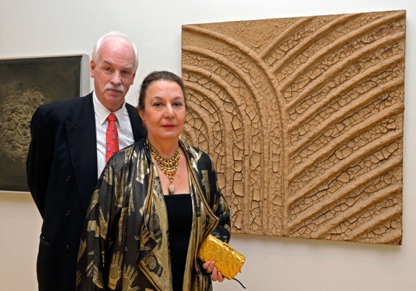 Thomas and Cleopatra Birrenbach pictured with "Crossroads (Earthwork)" (1975) by Marcos Grigorian. (Elsa Ruiz/Asia Society)